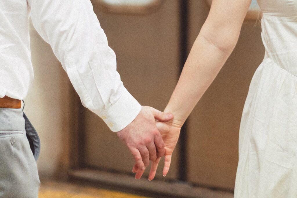 Holding hands on the subway