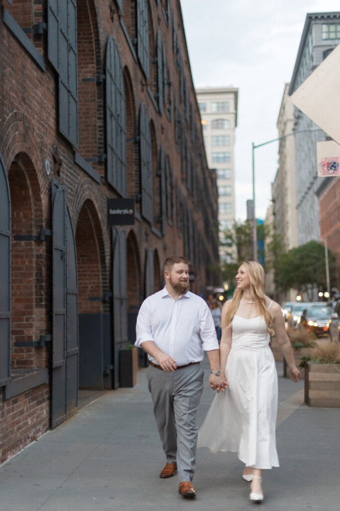 NYC engagement photos in DUMBO Brooklyn near Empire Stores